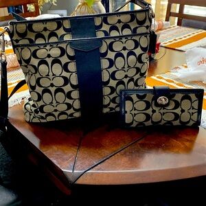 Coach fabric black with gray background purse with matching wallet.